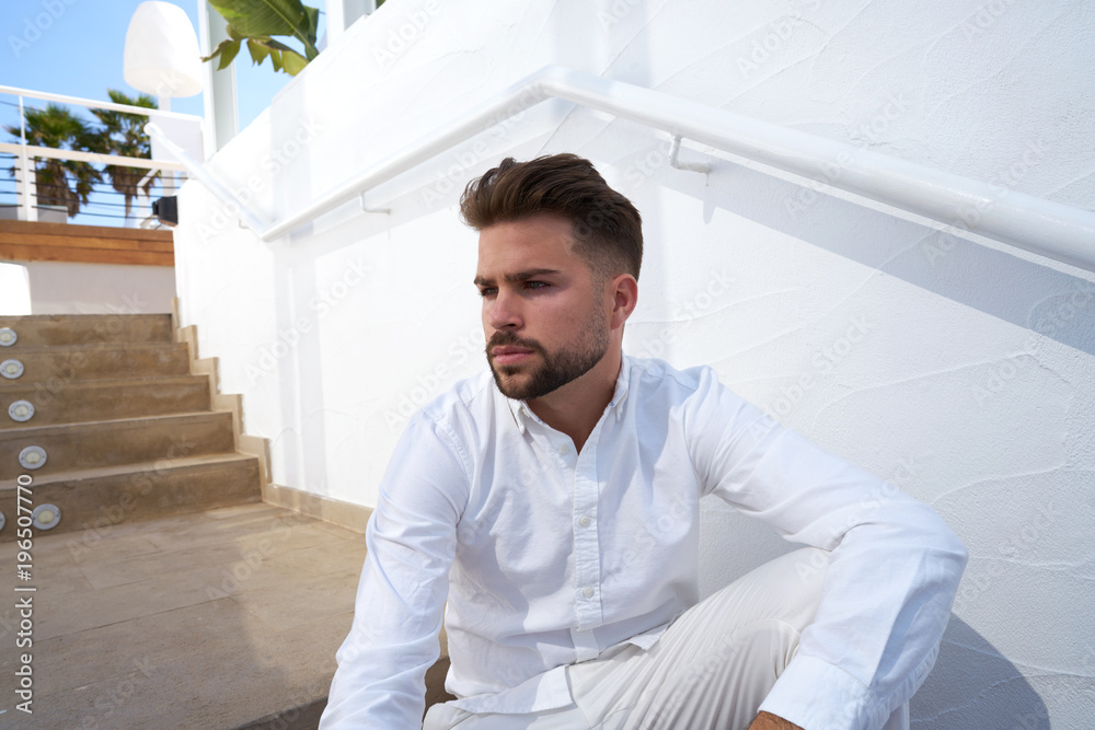Fototapeta premium young beard man in a white starway