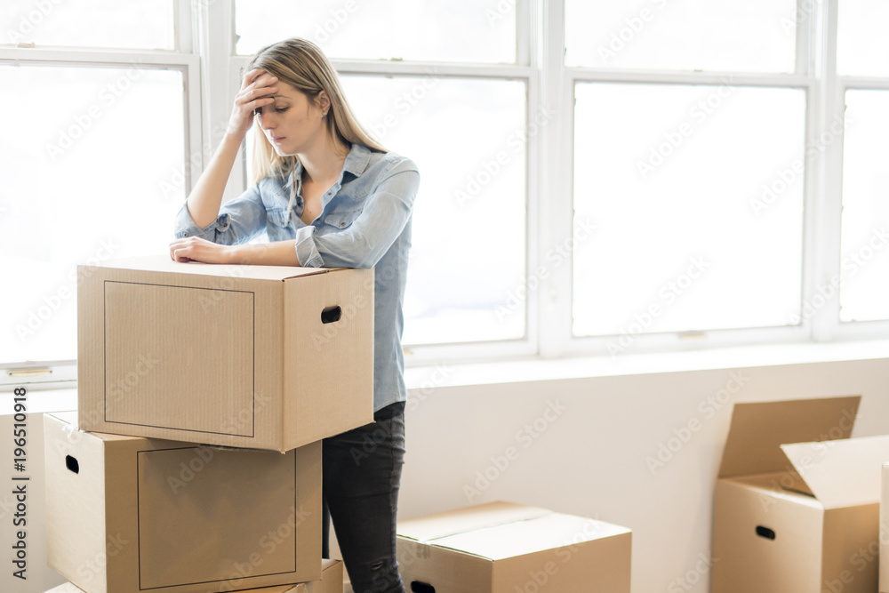 A woman with box at home A woman with box at home