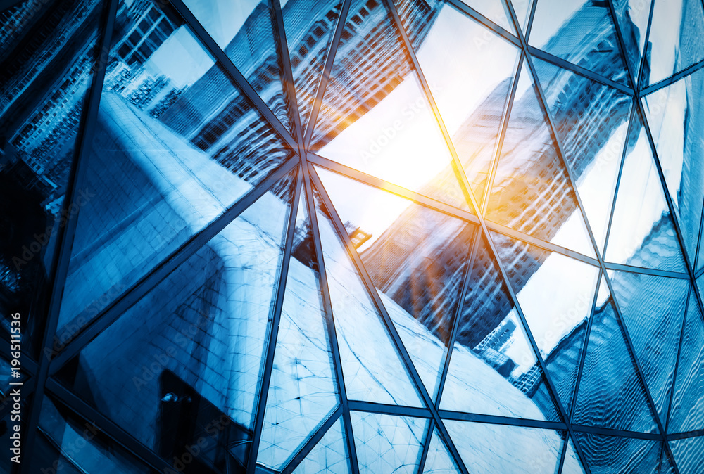 Fototapeta premium Geometric structure glass windows in skyscrapers