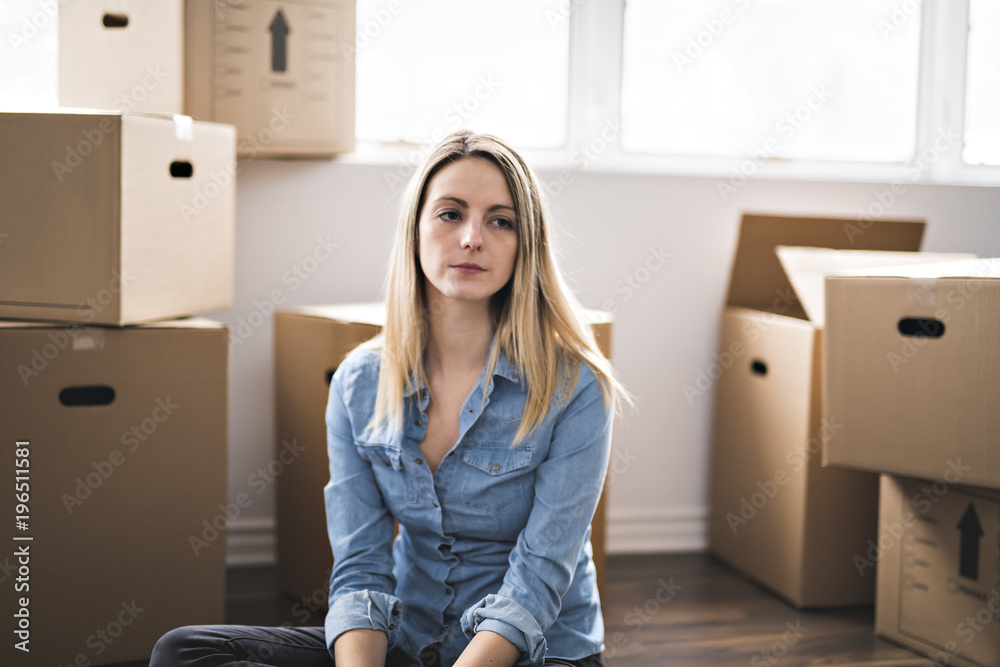 A woman with box at home A woman with box at home