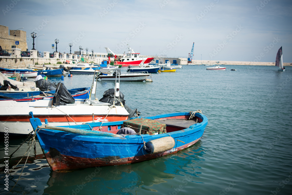 Horizontal View of Boats Moored in the Bari Touristic Harbour on Partially Cloudy Sky Background. Bari, South of Italy