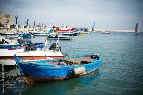 Horizontal View of Boats Moored in the Bari Touristic Harbour on Partially Cloudy Sky Background. Bari, South of Italy
