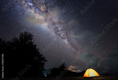 Night sky photograph with Milky Way core. Image contain soft focus, blur and noise due to long expose and high iso.