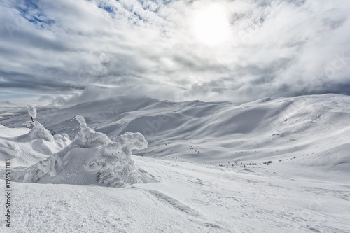 snow-capped peaks of mountains photo