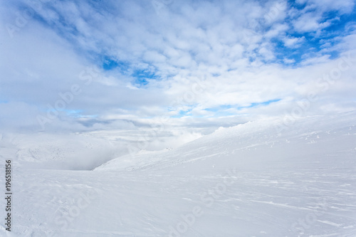 snow-capped peaks of mountains photo