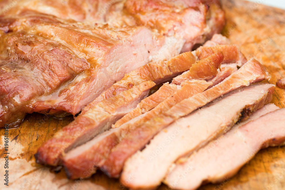 Close up tasty slice grilled pork on wooden board Close up tasty slice grilled pork on wooden board