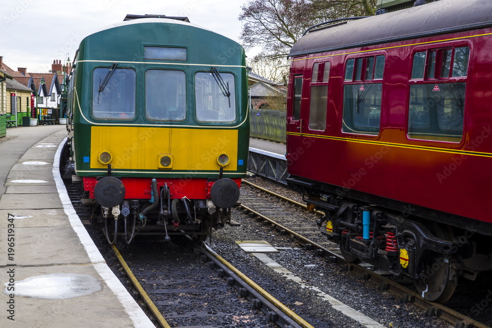 Class 101 DMU.
Heritage Diesel Multiple Unit, alongside a passenger carriage in a 1930’s styled station.
