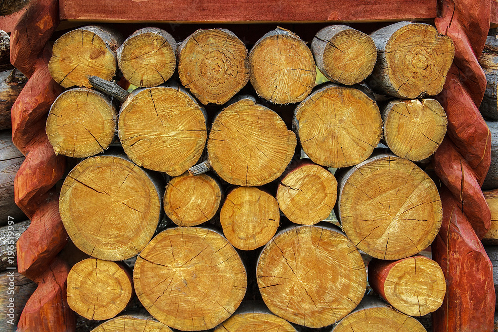 The texture of logs of medium size, stacked on top of each other. The texture of logs of medium size, stacked on top of each other.