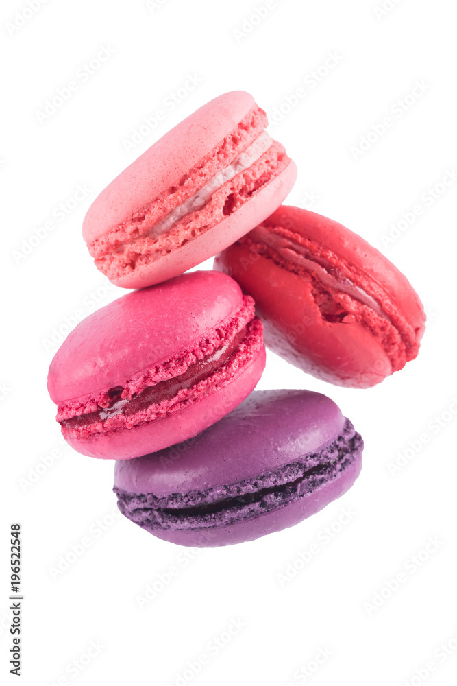 4 delicious pink cookies falling down isolated on white 4 delicious pink cookies falling down isolated on white