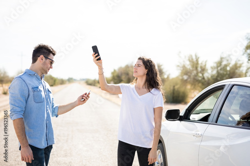 Canvas Print Searching phone coverage for car road assistance
