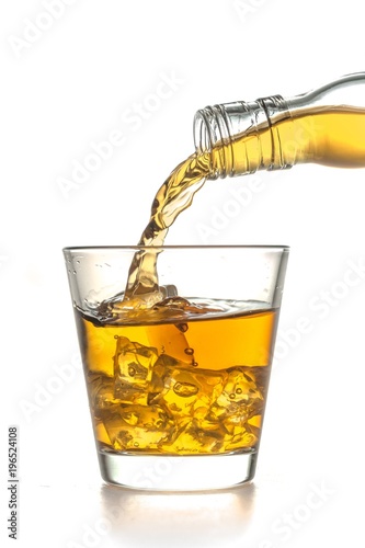 Pouring Whiskey into Glass