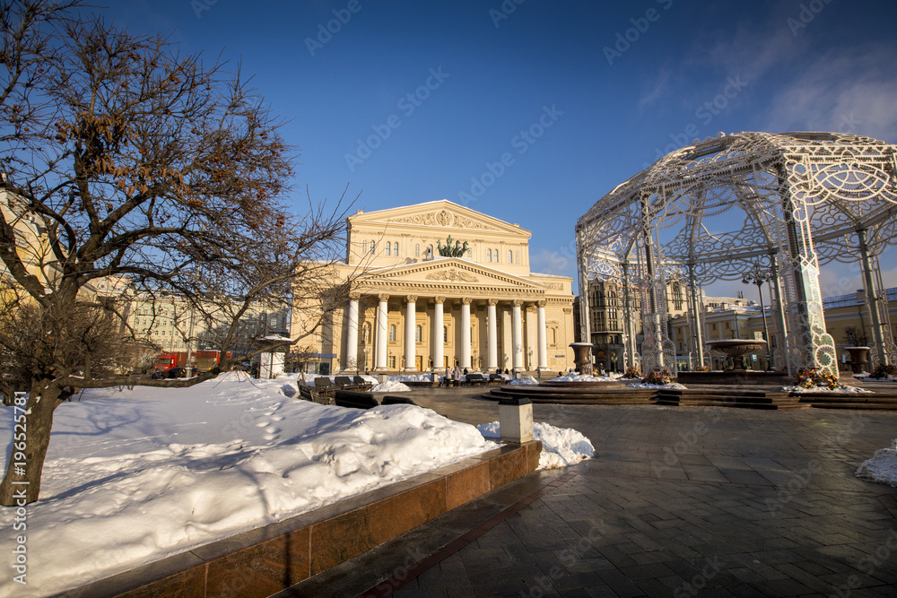 The Bolshoi Theatre, home of the Bolshoi Ballet is blanketed in snow, as the sun rises over Moscow, Russia.