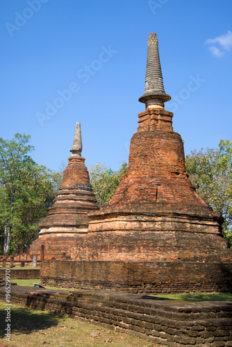 Two prangs on the ruins of the ancient Buddhist temple Wat Phra That. Kamphaeng Phet  Thailand