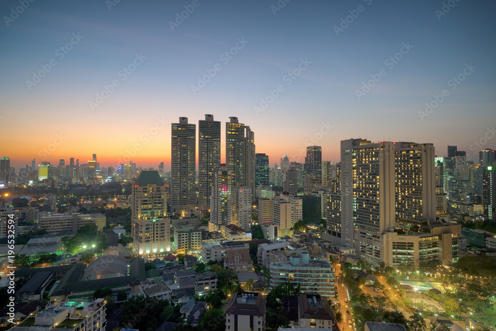 Top view : modern building in Business district at Bangkok city with skyline at twilight,Thailand.
