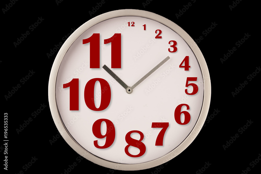 Crazy clock with irregular numbers. Small or big digits. Isolated on black background. With copy space text. Studio Shoot. Crazy clock with irregular numbers. Small or big digits. Isolated on black background. With copy space text. Studio Shoot.
