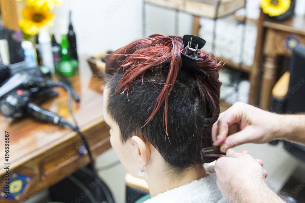 Naklejka premium hair blowing in the hairdresser