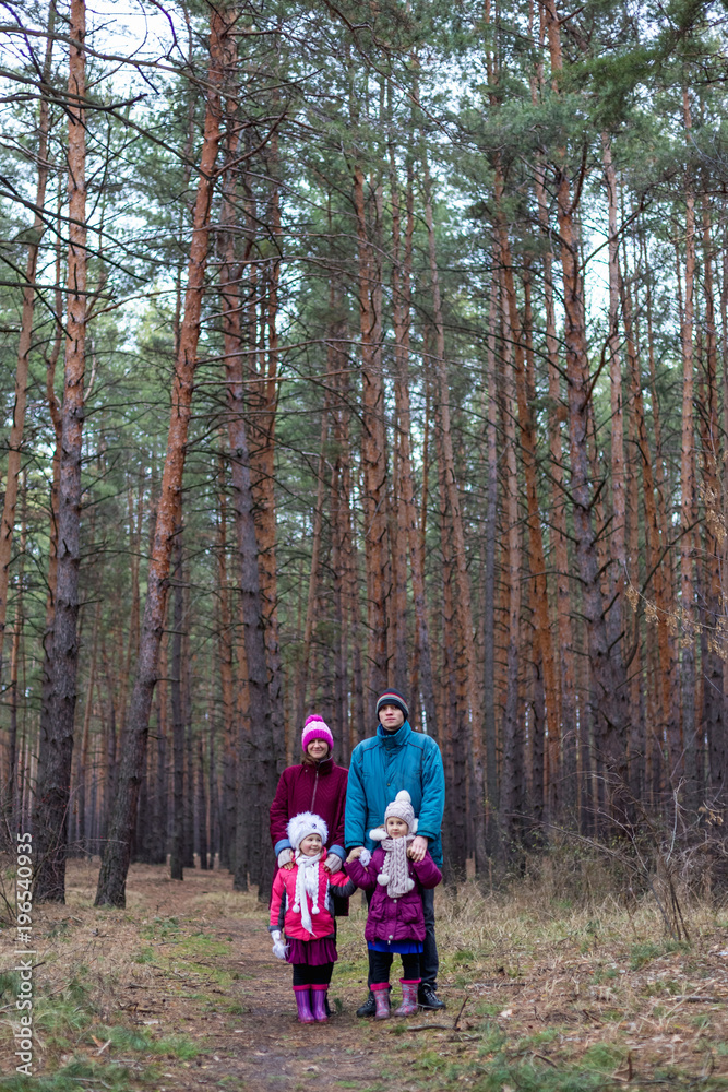 Fototapeta premium Rural family in autumn forest