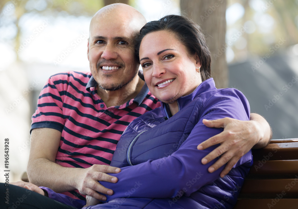 Fototapeta premium Mature couple sitting on the bench