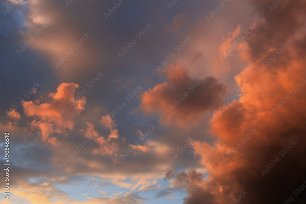 Blue sky with dynamic colorful clouds after rain