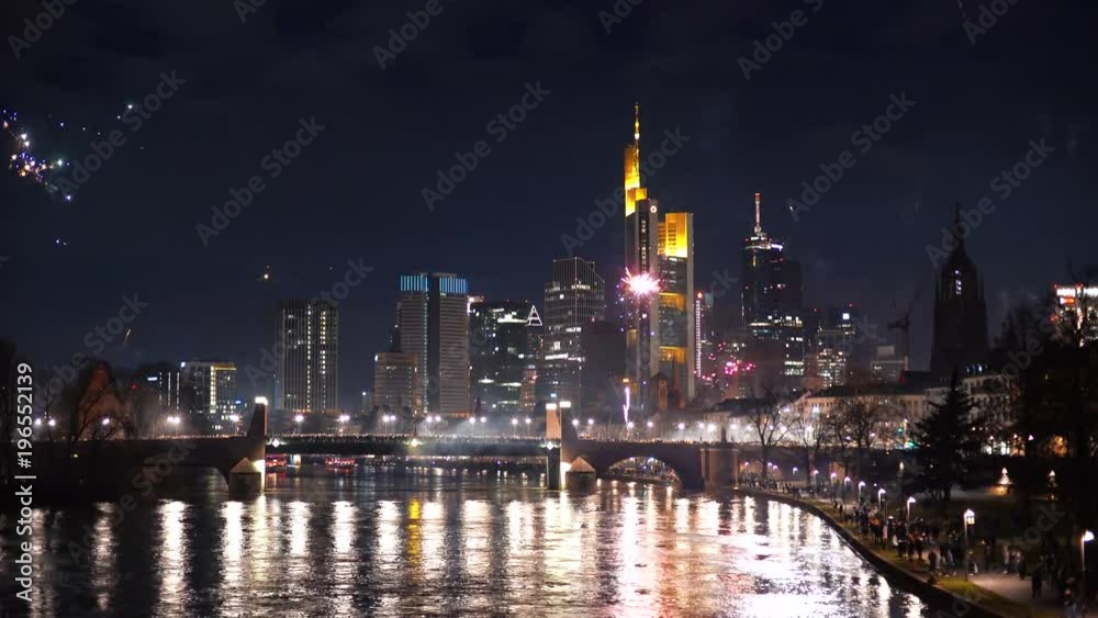 Frankfurt skyline with a firework show during New Year's Eve.