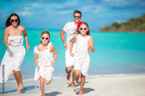 Happy beautiful family on the beach