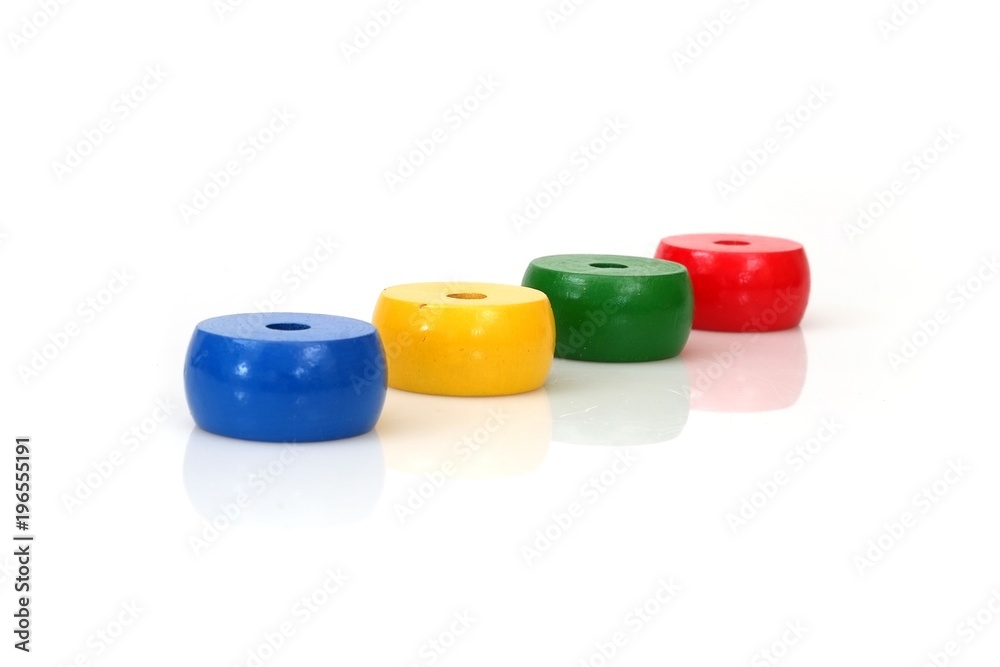 Children's toy stacked ring tower isolated on white background for creating a graphic design Children's toy stacked ring tower isolated on white background for creating a graphic design