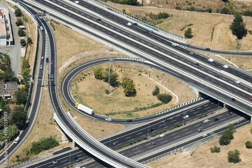 Aerial image of highway crossing at the city of Rome Roma photo