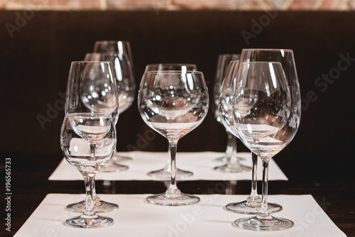 empty glasses of different shapes served for a wine tasting