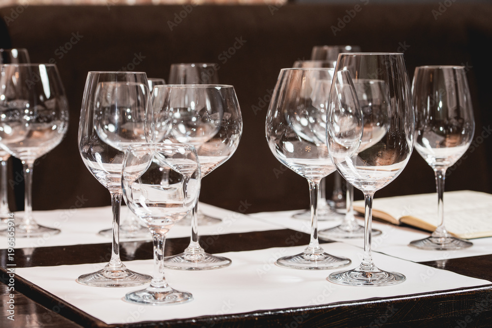 empty glasses of different shapes served for a wine tasting