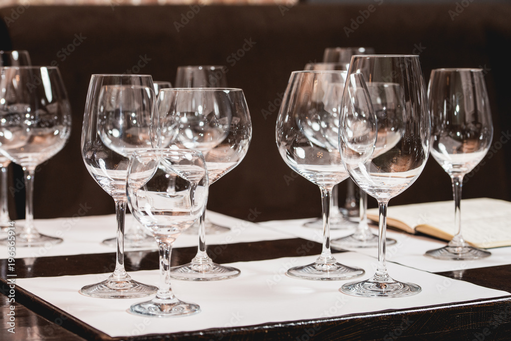 empty glasses of different shapes served for a wine tasting empty glasses of different shapes served for a wine tasting