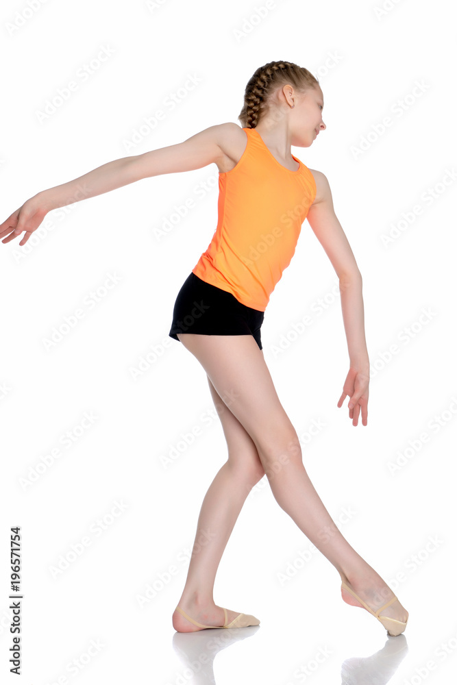 A teenage girl is engaged in fitness. A teenage girl is engaged in fitness.