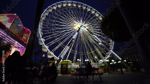 Ferris Wheel in the night panoramic wheel giant wheel in the Nice