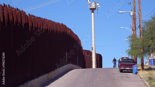 A view along the US Mexico border at Nogales, Arizona. photo