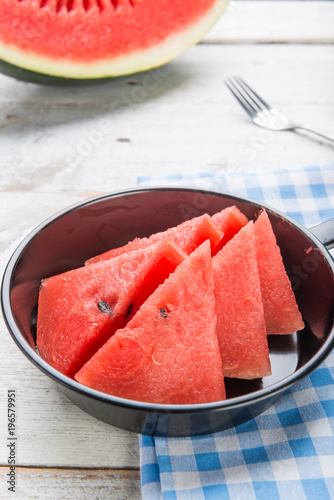 Watermelon on wooden table background