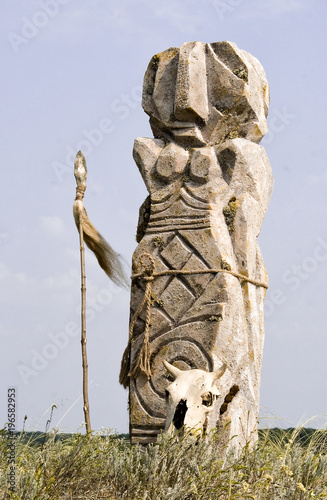 Scythian stone idol in the steppe photo