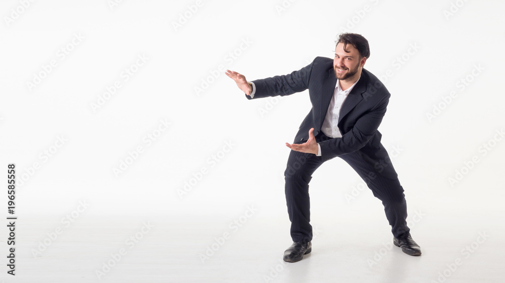 Businessman isolated over white background presenting copyspace Businessman isolated over white background presenting copyspace