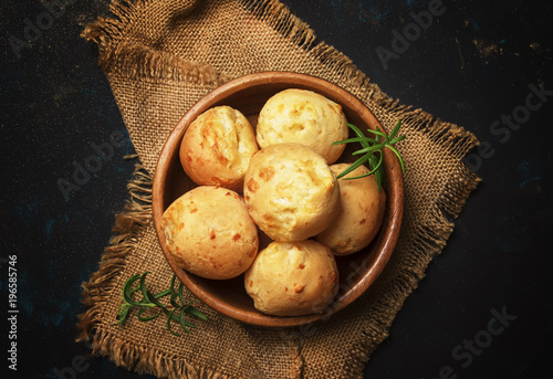 Homemade cheese buns, rustic style, vintage wooden background, top view photo