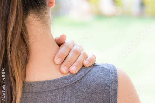 Photography Closeup woman neck and shoulder pain and injury