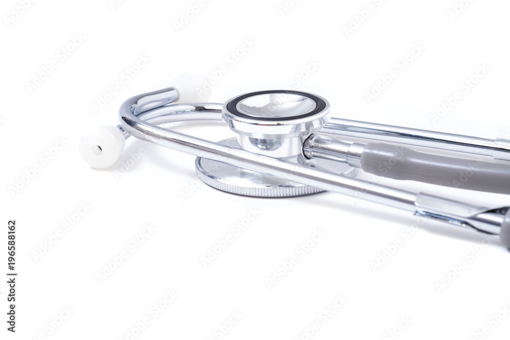 Page with stethoscope on white table background, medical concept.