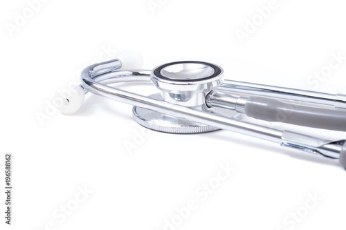 Obraz na płótnie Page with stethoscope on white table background, medical concept. w salonie