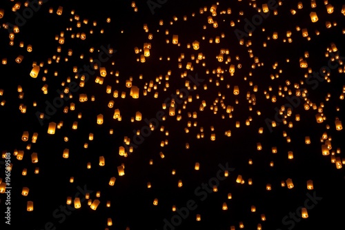 Multiple sky lanterns during loy krathong celebration in Chiang Mai. Thailand. Version 2.