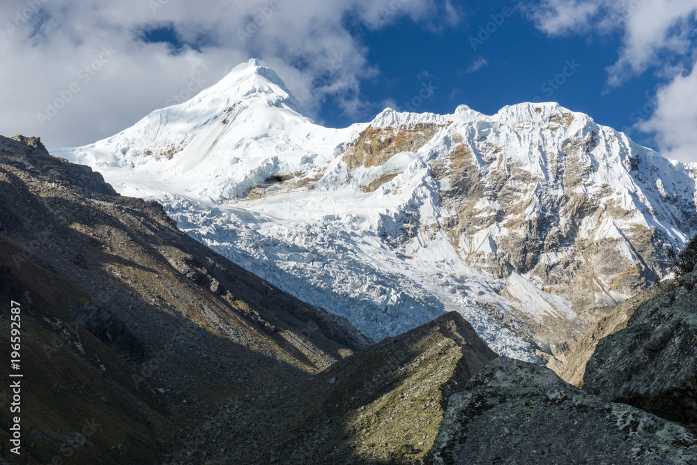 high snowy mountain peak in the Andes in Peru