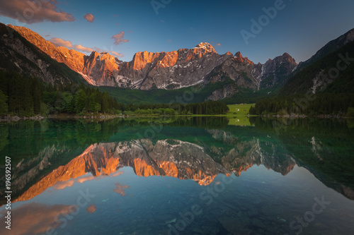 Mountain lake in Italy during sunset. 