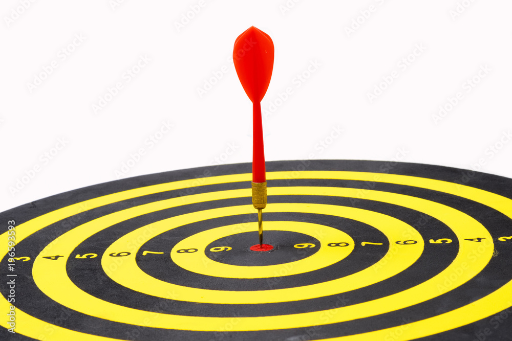 Close up of dartboard with red dart arrows in center on white background. Business Success Concept Close up of dartboard with red dart arrows in center on white background. Business Success Concept