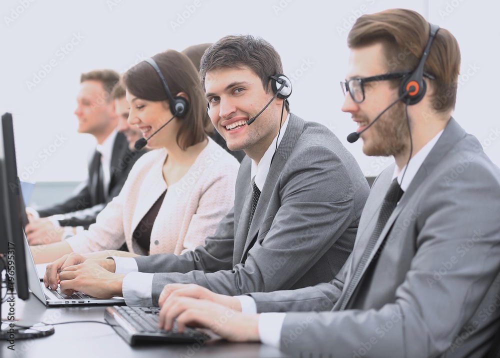 employee call center with headset at workplace employee call center with headset at workplace