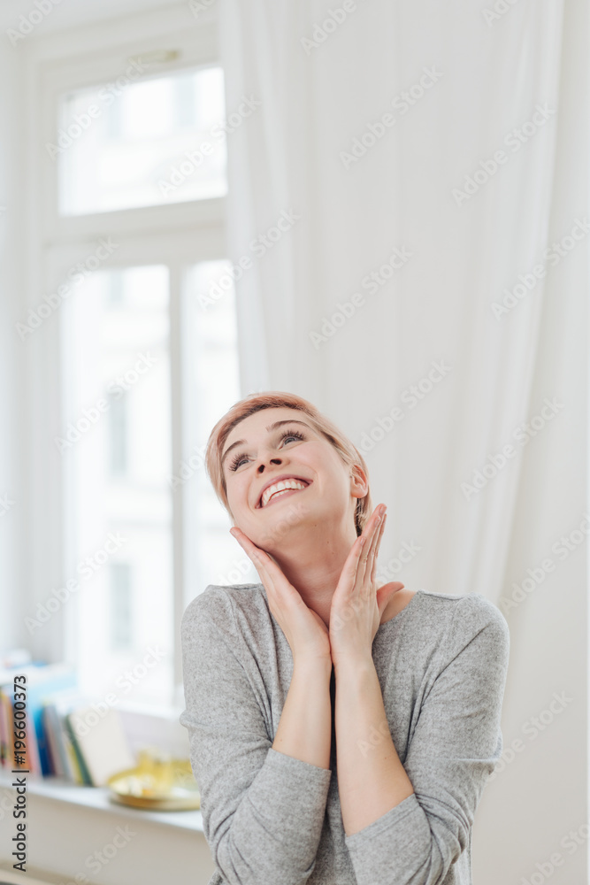 Nostalgic attractive young woman daydreaming Nostalgic attractive young woman daydreaming