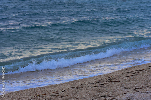 Fototapeta Naklejka Na Ścianę i Meble -  View from the beach at blue sea with little wave background