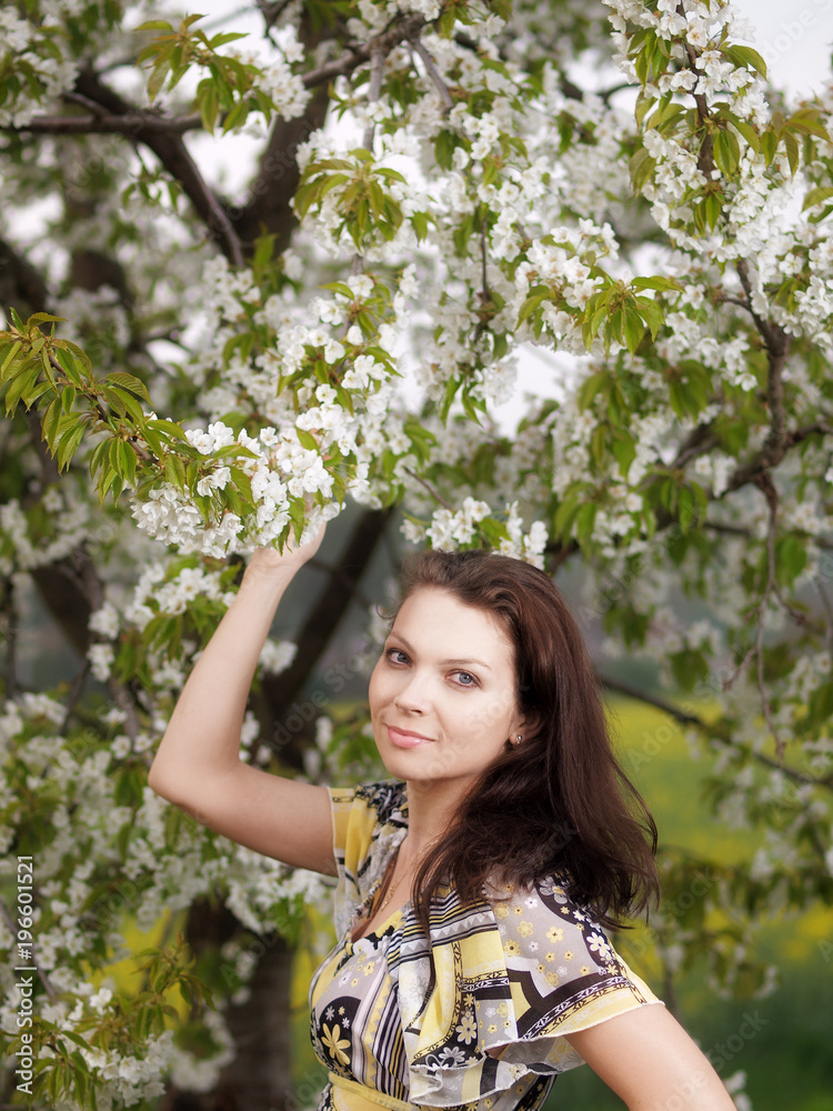Outdoor young woman during springtime