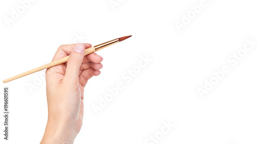 paint brush in hand isolated on white background. copy space, template