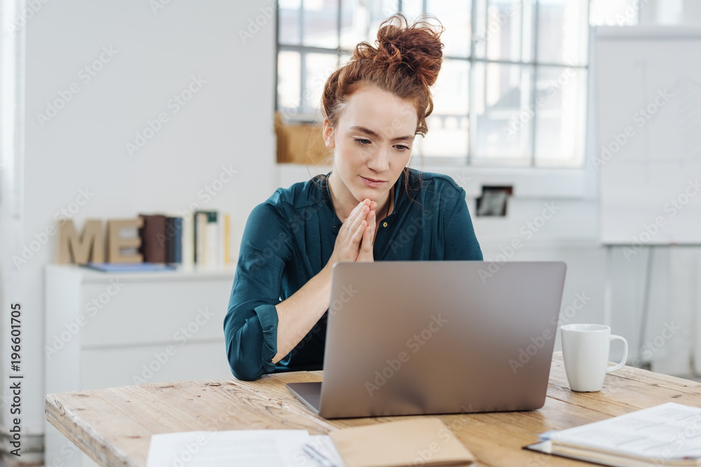 Attractive businesswoman with her hair in a bun Attractive businesswoman with her hair in a bun